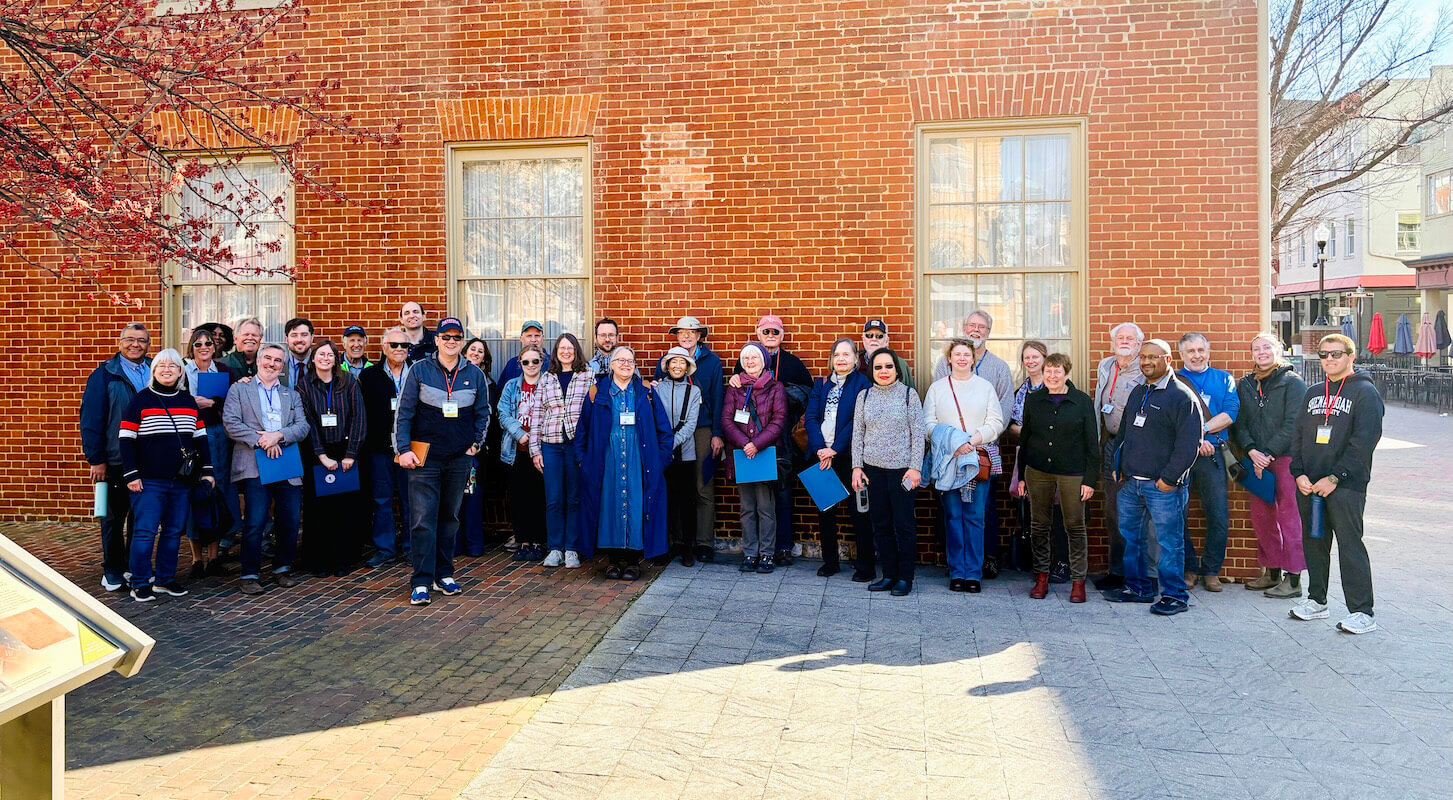 Group photo of participants on the walking tour during the Virginia Forum.