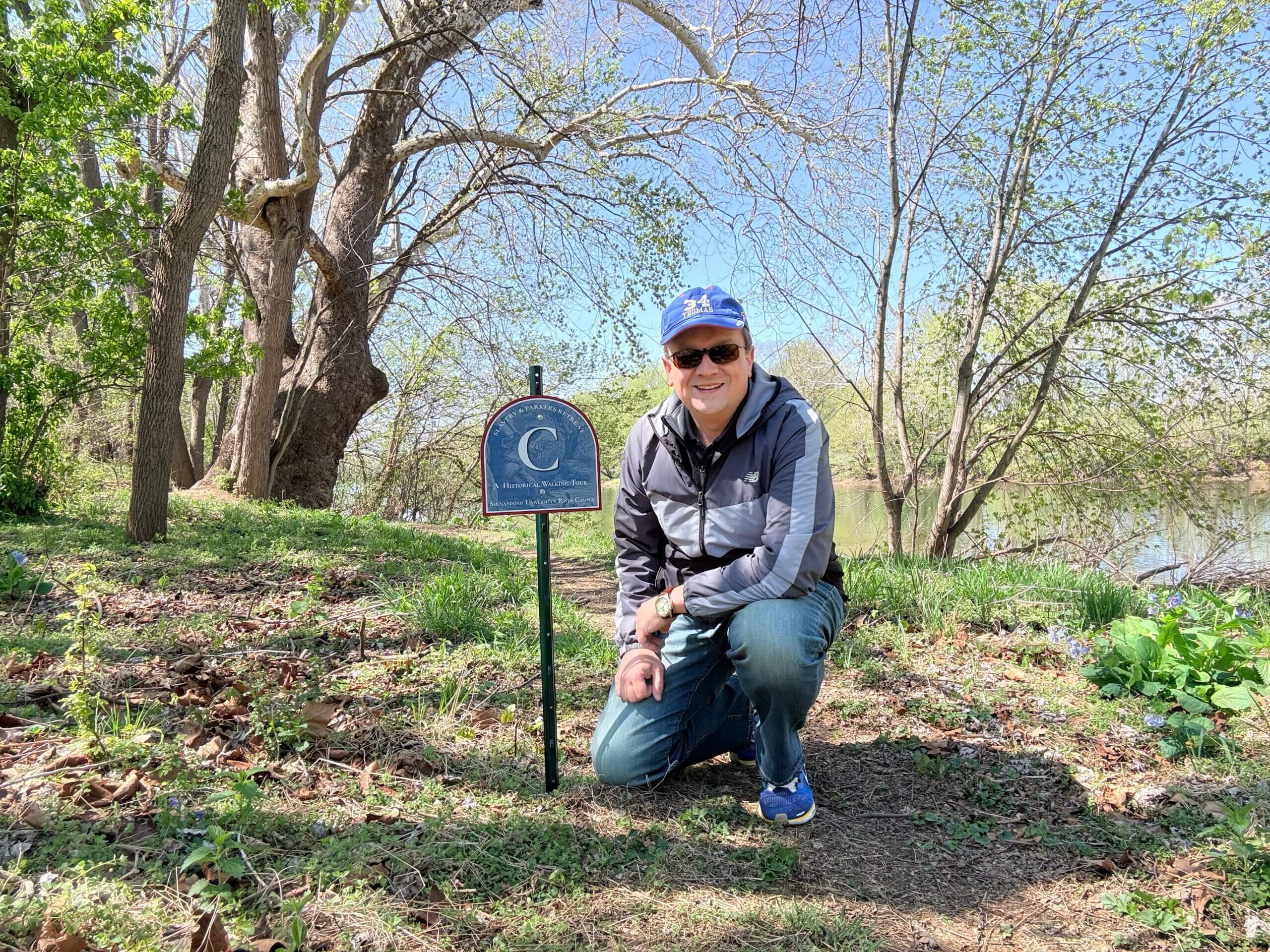 Noyalas crouched at tour stop C on the slavery tour