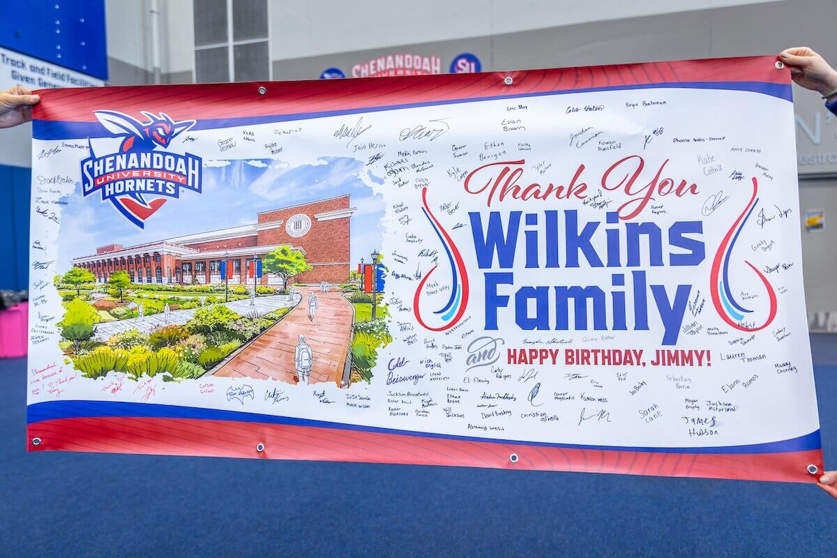 A banner thanking the Wilkins family, signed by student-athletes, faculty and staff at Shenandoah.