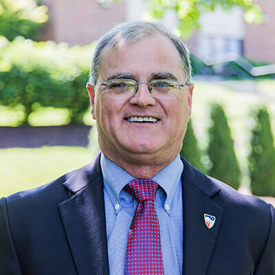 Senior Vice President Mitchell L. Moore