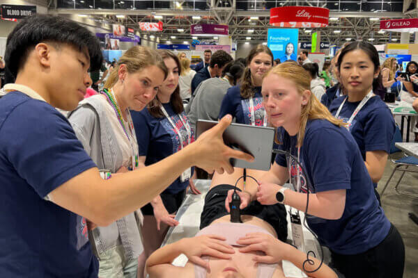 Shenandoah PA students use a handheld ultrasound machine during a national competition.