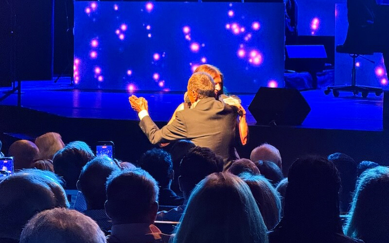 Paul Anka dances with Shenandoah University President Tracy Fitzsimmons.