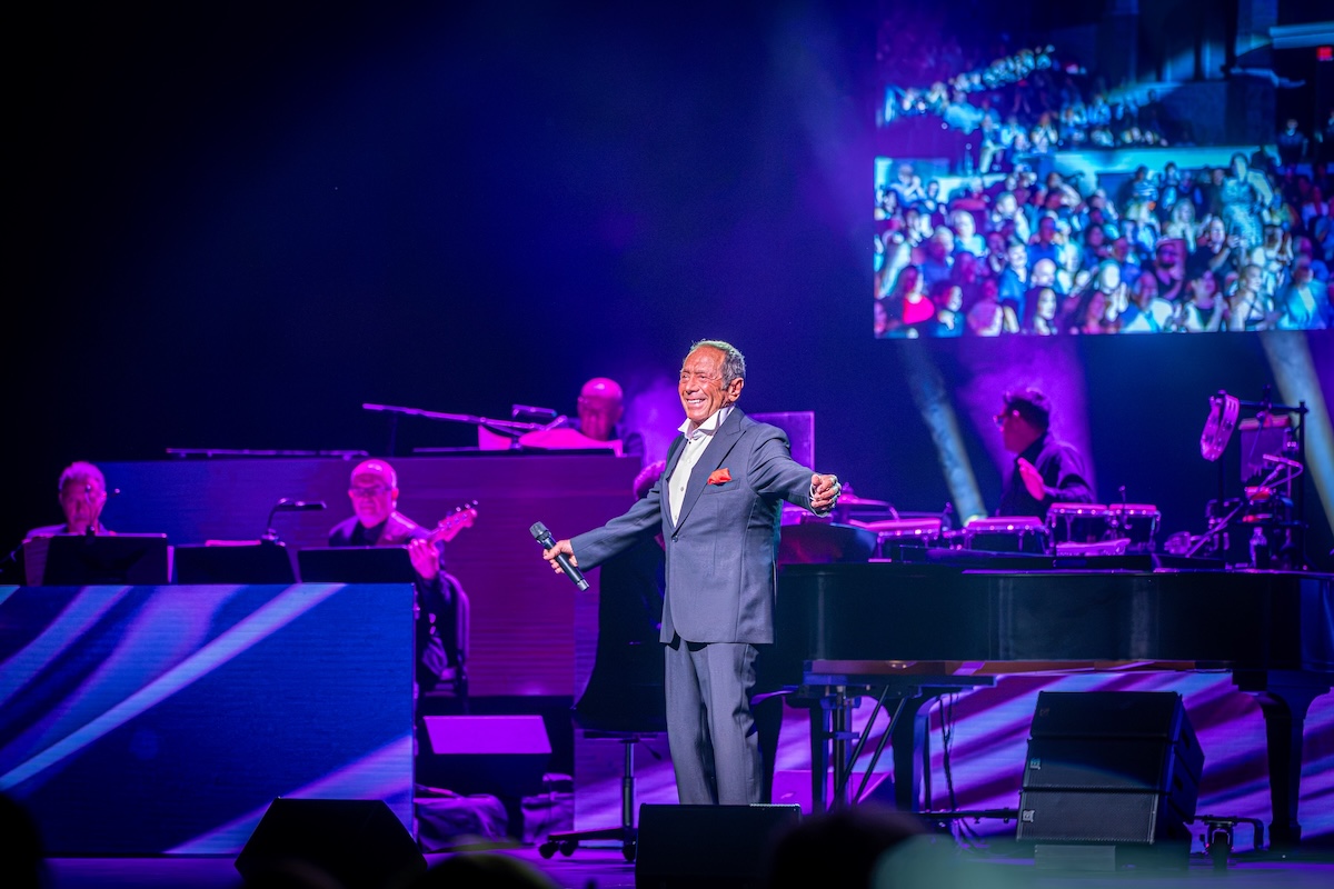 Paul Anka performing on-stage.